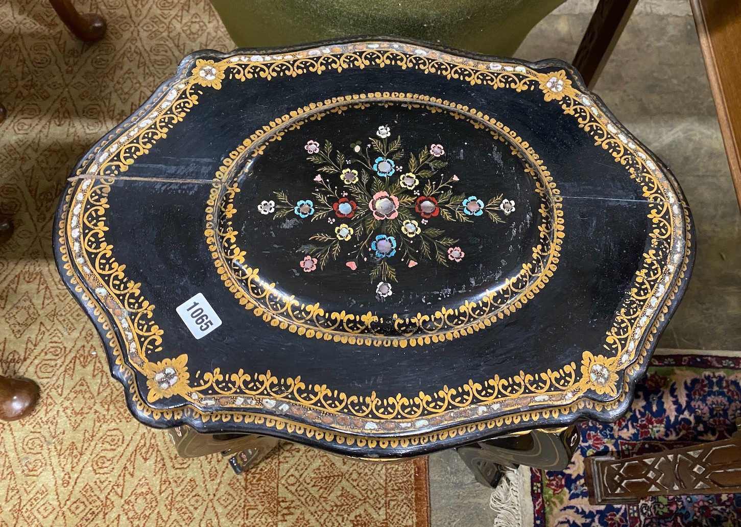 A 19th century French mother of pearl inlaid, parcel gilt ebonized and papier-mâché work table width 53cms, depth 38cms, height 68cms.